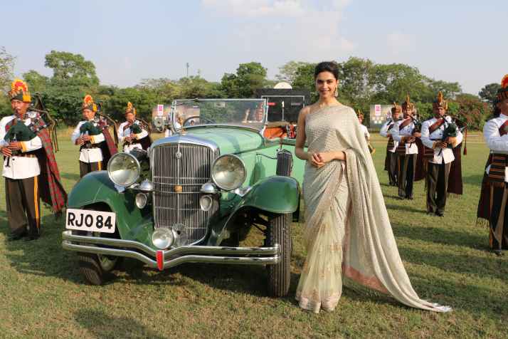 Deepika enters the polo ground in vintage car
